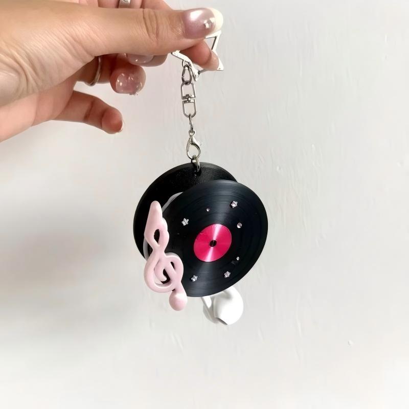 Y2K Vintage Record Shaped Earp - đánh giá và giá Cable Winder Keychain