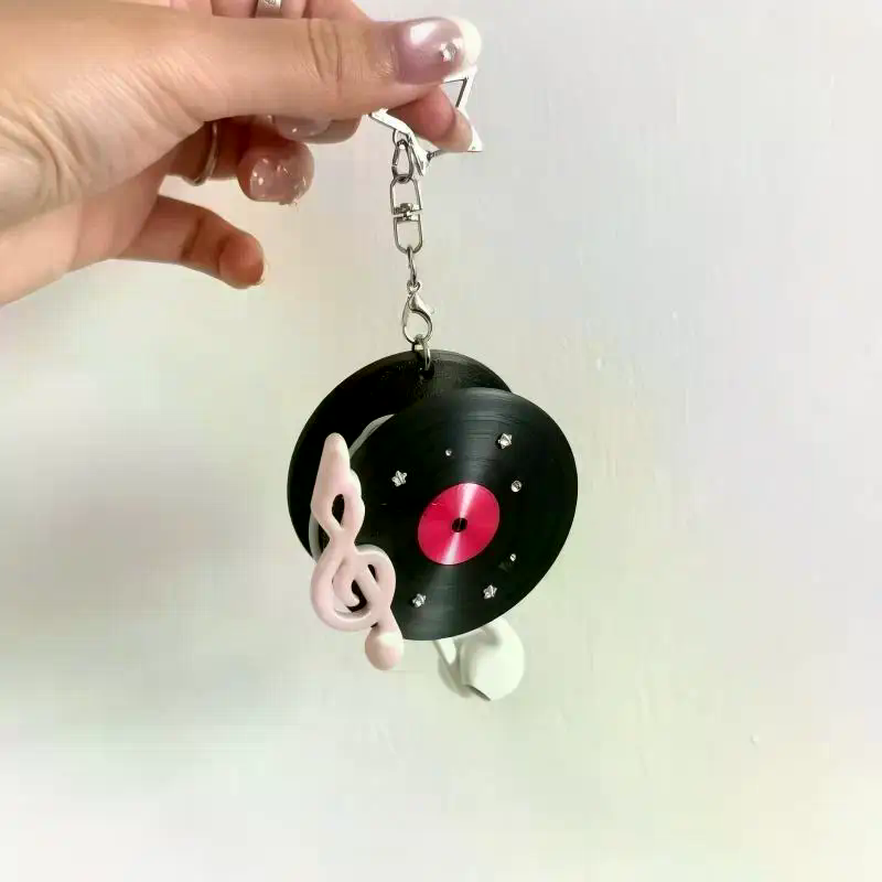 Y2K Vintage Record Shaped Earp - đánh giá và giá Cable Winder Keychain